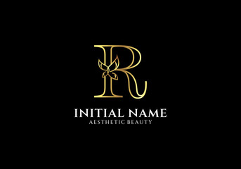 Initial R Letter Logo Design with Butterfly or Leaf Element