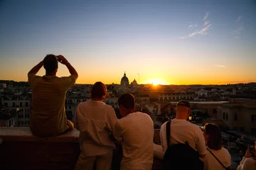 people at sunset looking at cityscape of Rome city © vojta