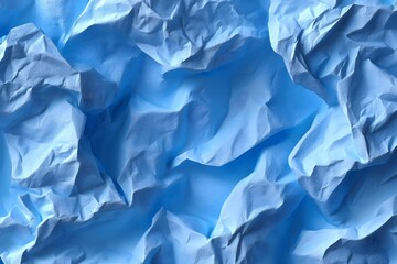 Obraz premium High-resolution blue paper texture with prominent creases and natural folds. Perfect for backgrounds, overlays, or abstract design elements.