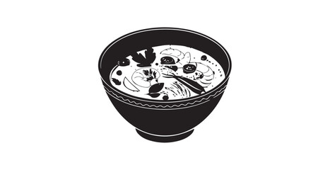 Delicious tom yum goong soup with shrimp and herbs in a black bowl silhouette