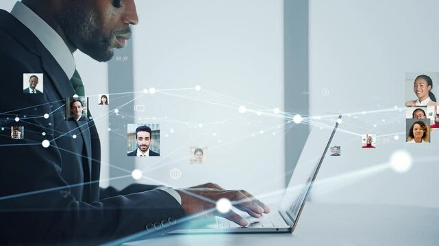 パソコンで作業する外国人男性とグローバルネットワークのコンセプト