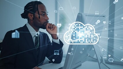 Black man working on a computer and cloud computing concept - Powered by Adobe