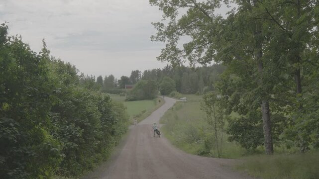 Forest Road Through Finnish Countryside  - 4K - SLOG- Flyover

