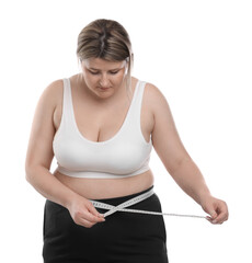 Weight loss. Plus size woman measuring waist with tape on white background