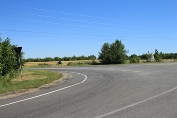 A road with trees on the side