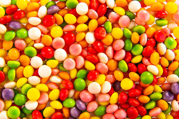 colorful candy background, rainbow coated candies texture background