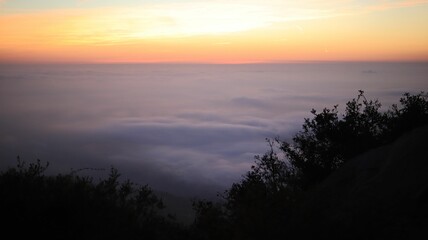 Fototapeta premium Golden Hour to Moonrise: Strawberry Full Moon Hike at Potato Chip Rock