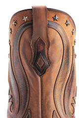 Vintage Style Cowboy Boot Close-Up. Textured leather with western scrollwork and star trim.