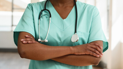 Close-Up of Medical Professional in Scrubs With Stethoscope Highlighting Healthcare and Caregiving