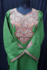 Display of Kashmiri Pheran , Traditional Dress of kashmir