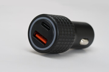 black mobile car charger isolated on white background