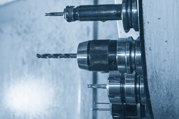 The hole tool in the tool magazine of machining center in the light blue scene.