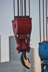 Old Crane Hooks in a Harbor