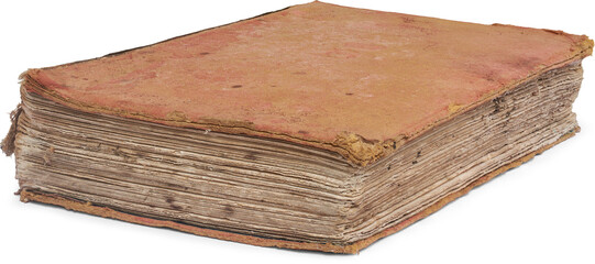 close-up of old torn book isolated white background, discolored and ruined book with frayed edges side view
