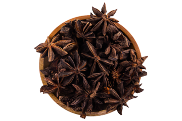 star anise in wooden dish, top view isolated on transparent background. png image
