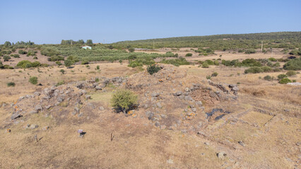 Drone shot of ancient pentalobate nuraghe ruins, Sardinia's prehistoric stone architecture