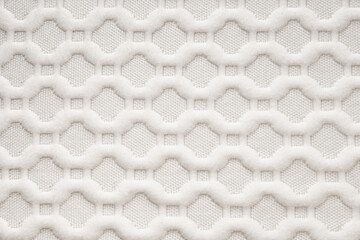 White background from mattress textile. Texture. Abstract seamless pattern.