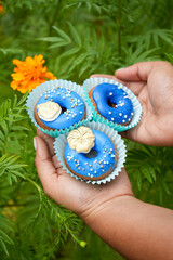 little girl holding a flower