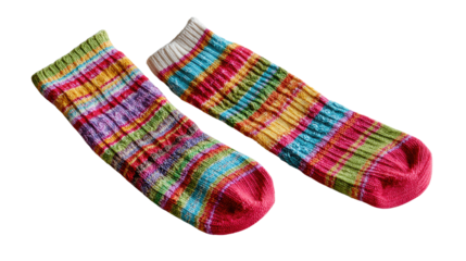 Playful Pair: A pair of vibrant, colorful socks, each radiating individual charm, lies invitingly on display, suggesting a world of warmth and coziness. 
