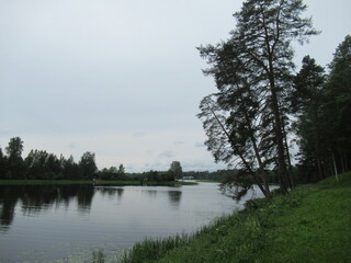 The landscape stretches into the distance with a view of the river. The water surface. Nature in...