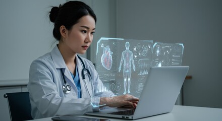 Focused doctor working on laptop, holographic medical visualizations