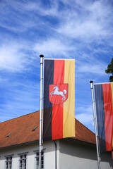 The Lower Saxony flag blows in front of a building, Germany