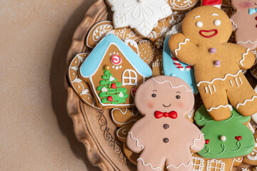Gingerbread cookies with icing decoration. Christmas food. Gingerbread man baking. Top view table....
