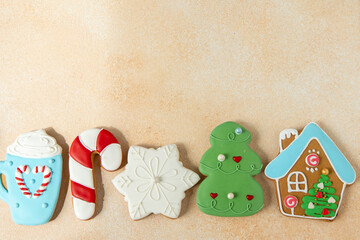 Gingerbread cookies with icing decoration. Christmas food baking. Top view table. Xmas sweets...