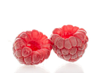 Fresh sweet raspberries isolated on white background, macro.