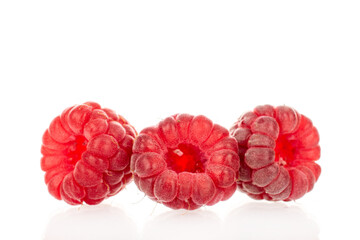 Fresh sweet raspberries isolated on white background, macro.