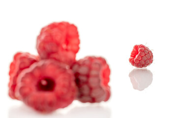 Fresh sweet raspberries isolated on white background, macro.
