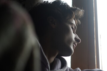 Color portrait of a young Kashmiri Gen Z boy, capturing the essence of modern youth with quiet...
