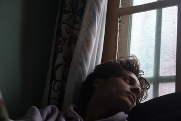 Color portrait of a young Kashmiri Gen Z boy, capturing the essence of modern youth with quiet...