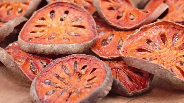 Dried bael fruit in a plate