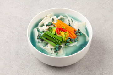 Handmade noodles boiled with tea leaves.