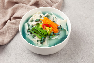  Handmade noodles boiled with tea leaves.