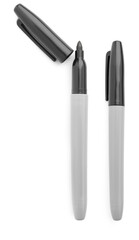 Black markers isolated on white, top view