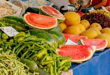 vegetables and fruits on a farmer's market counter