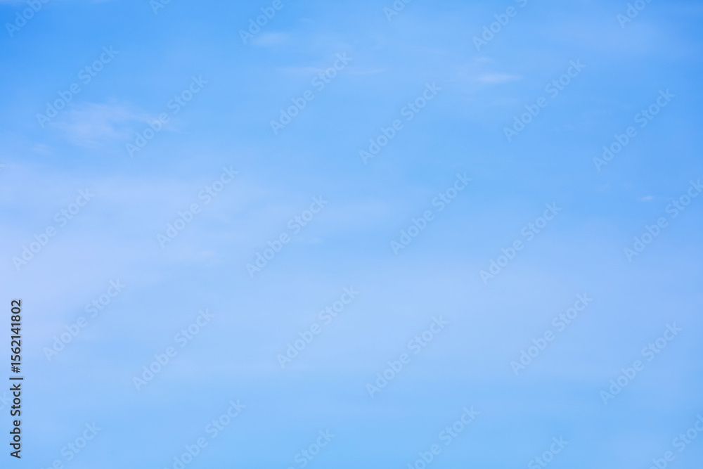 Wall mural fantastic soft white clouds against blue sky and copy space horizontal shape. web banner.website hea