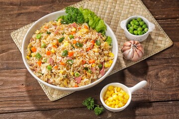 Nasi goreng Hongkong. Chinese Fried rice is a dish of cooked rice that has been stir-fried in a wok...