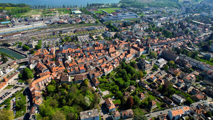 An Panoramic aerial of the old town of the city Yverdon-les-Bains in Switzerland on a sunny day in summer	
