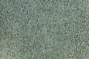 Close-up view of grey textured surface with rough grainy finish