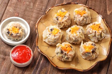 Siomai, Siomay, Shumai or Shumay is a type of dimsum which is a traditional Chinese food.