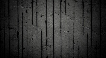 Dark gray textured wall with vertical black lines and cracks shadowed at edges