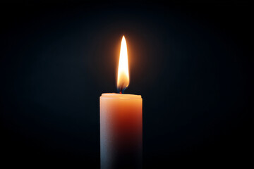 single candle burning with bright flame in dark background creating warm and peaceful light atmosphere calm solitude and focus
