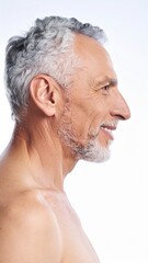 Obraz premium Mature Man Profile Portrait Silver Hair Healthy Skin Wellness Concept.