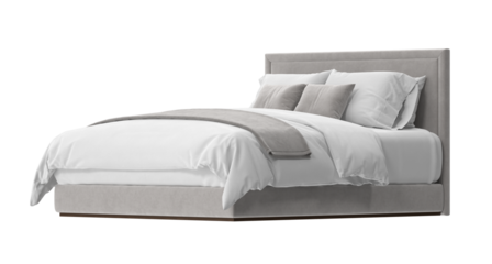 A beautifully made bed with soft, white bedding and a gray bedframe