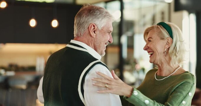 Senior, happy couple and dancing with love in home for christmas celebration or december holiday. Elderly, man and woman with smile, spin or twirl in joy for romance, festive or retirement in house
