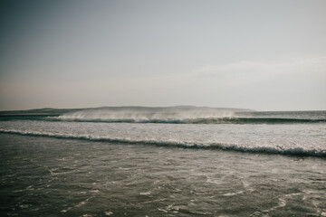 The ocean is calm and the sky is clear