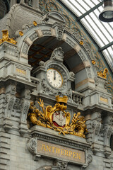 the detail of the clock in Antwerp central station building 